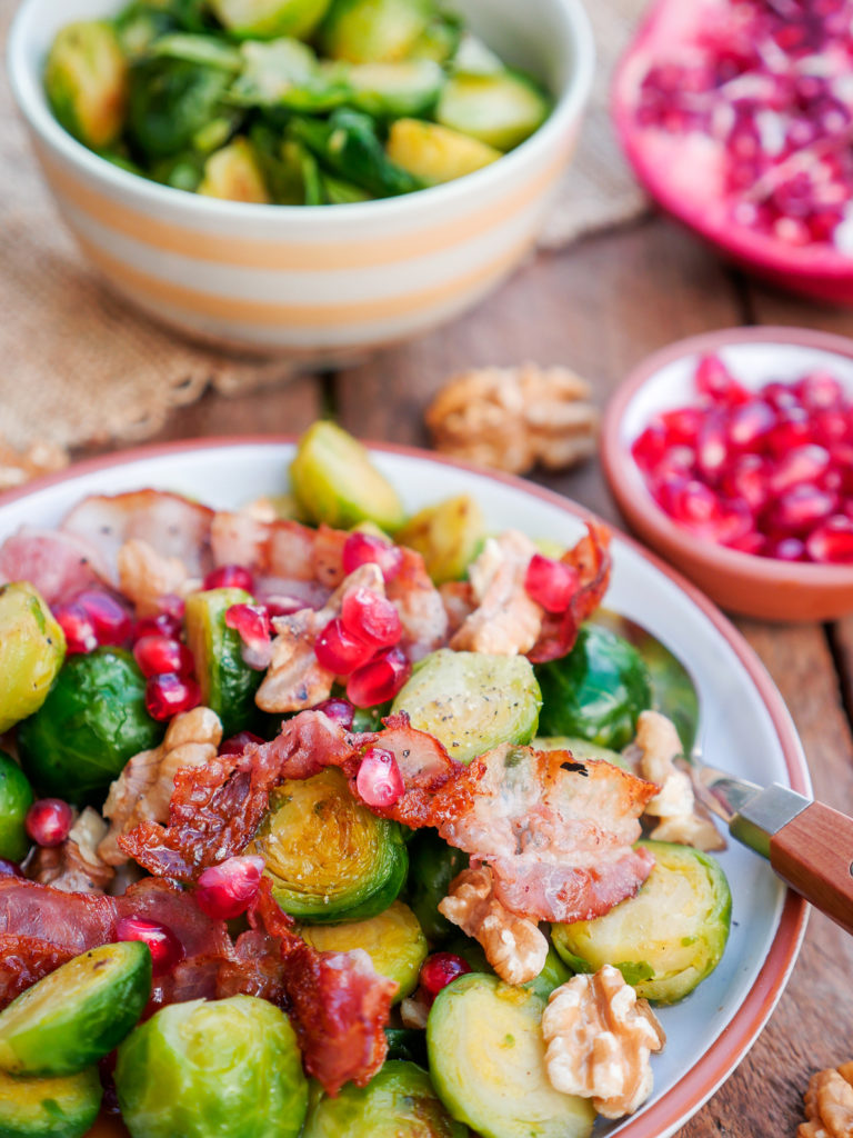 Fried brussels sprouts with bacon, walnuts and pomegranate 